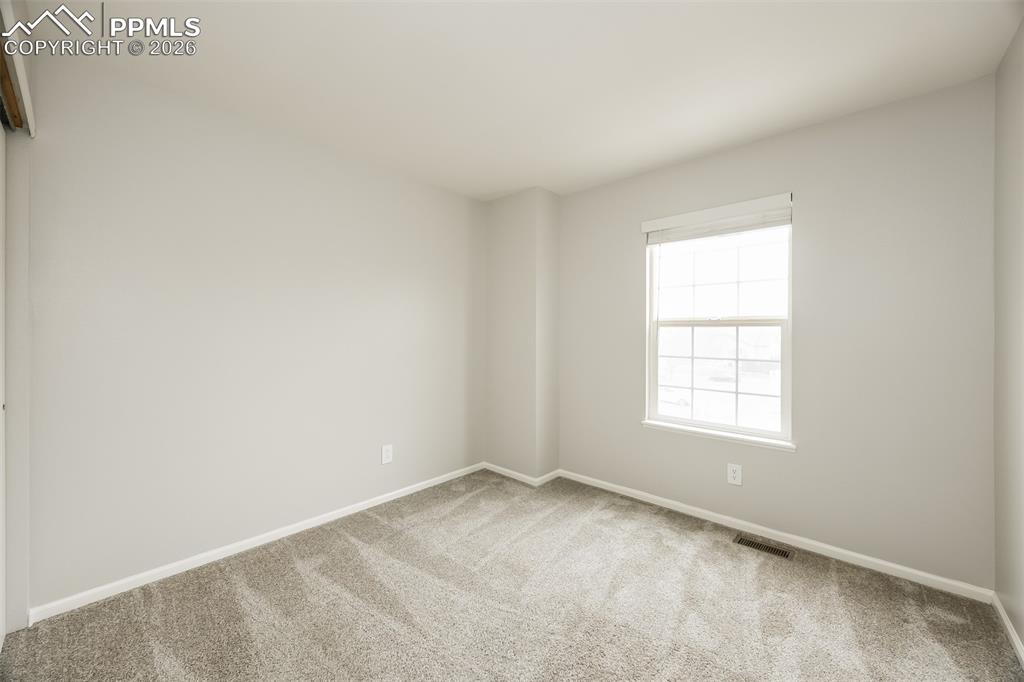 Image 14 of 23: Bedroom