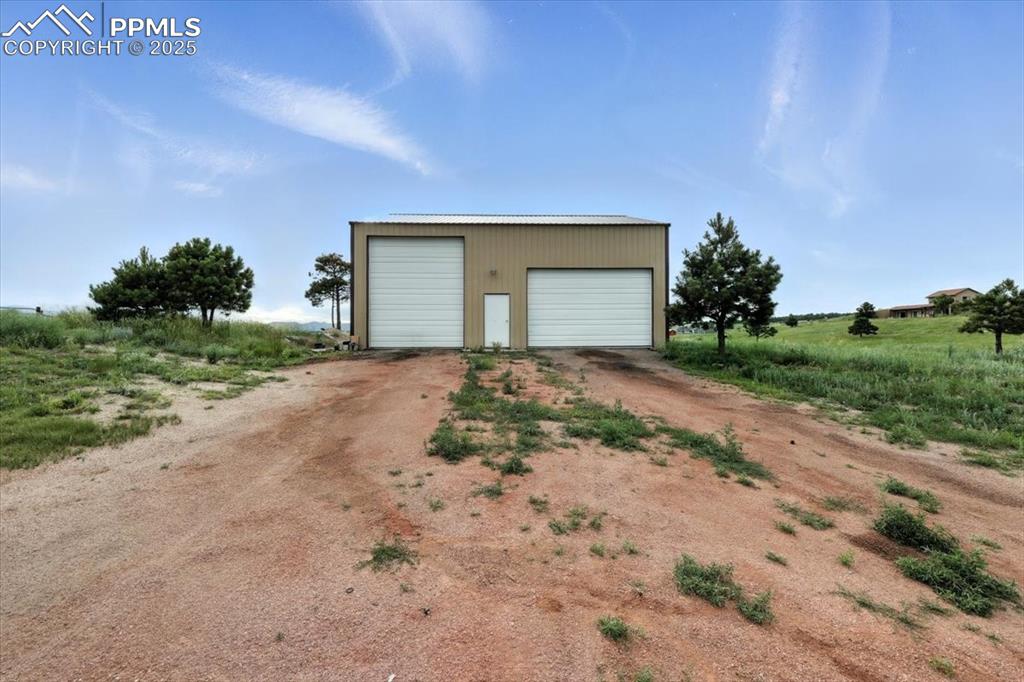 Image 22 of 29: View of detached garage