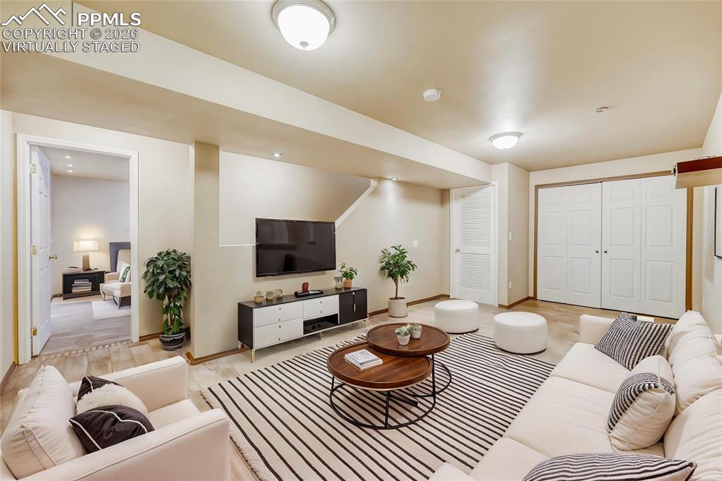 Image 28 of 30: Virtually Staged basement Bonus Room