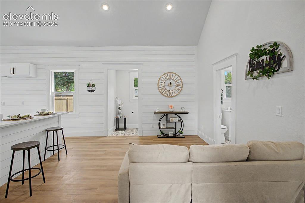 Image 2 of 19: Vaulted ceiling featuring recessed lighting