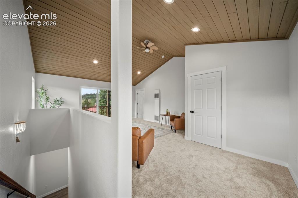 Image 15 of 30: Spacious upper level with tongue-and-groove ceilings