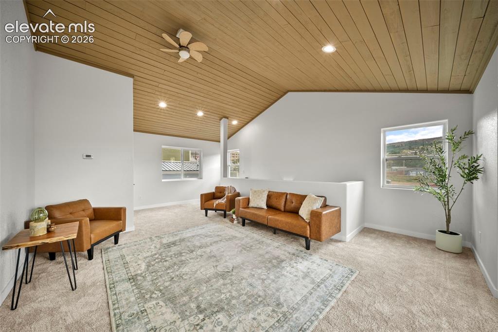 Image 17 of 30: Spacious upper level with tongue-and-groove ceilings