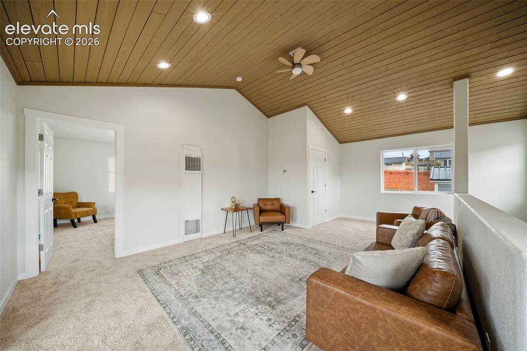 Image 18 of 30: Spacious upper level with tongue-and-groove ceilings