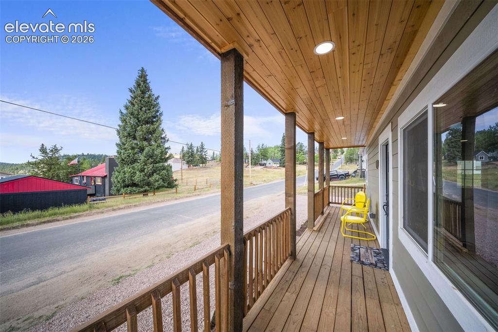 Image 4 of 30: Welcoming covered front porch