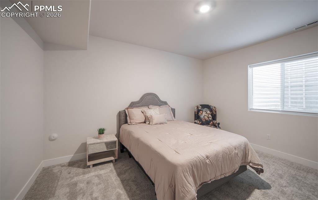 Image 31 of 43: Basement level Bedroom