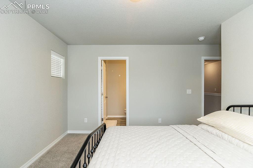 Image 14 of 33: Bedroom