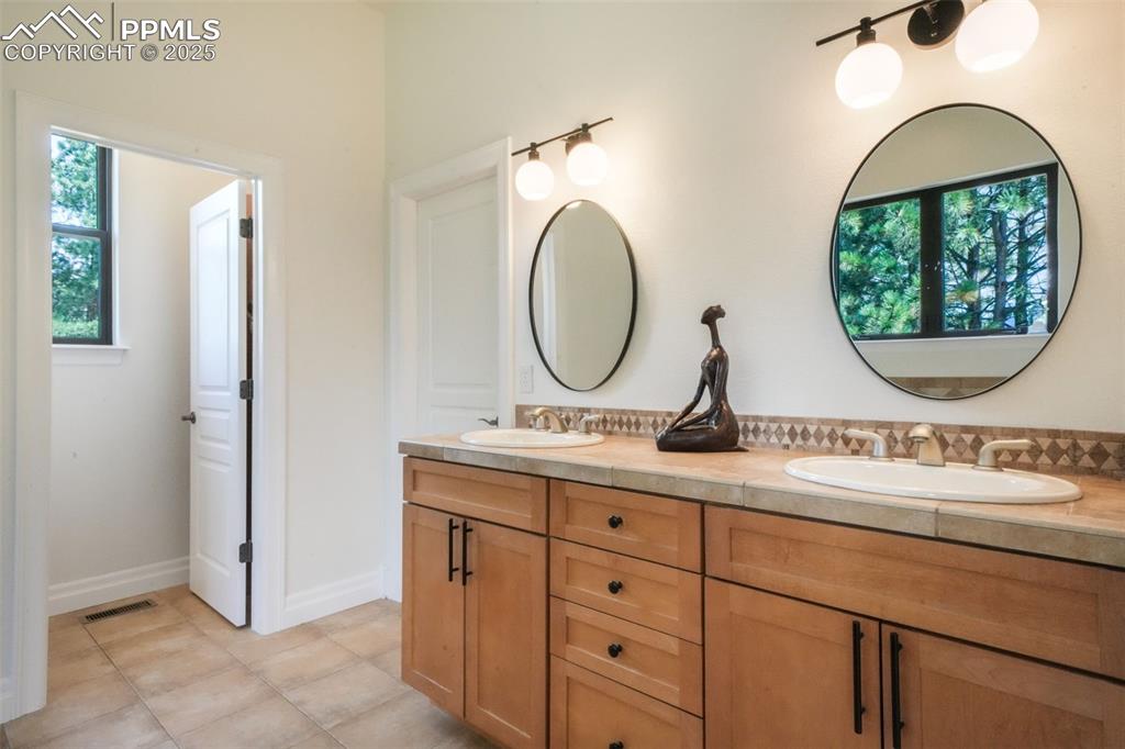 Image 12 of 49: Master Bathroom