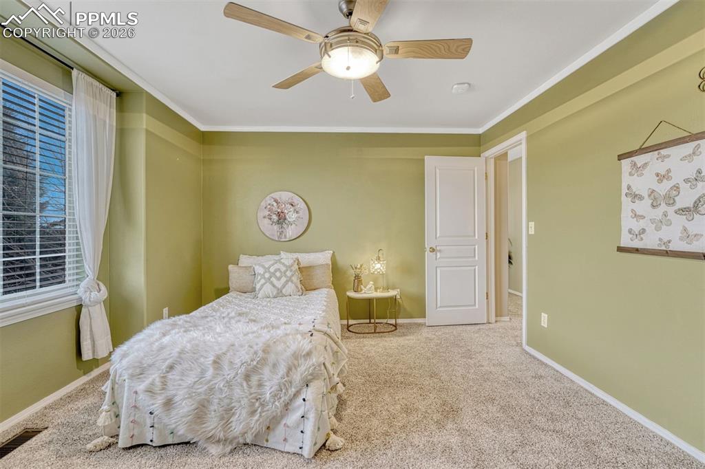 Image 18 of 38: Bedroom