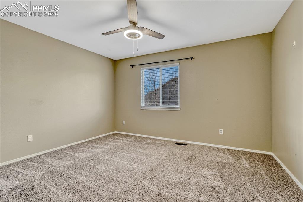 Image 22 of 38: Bedroom