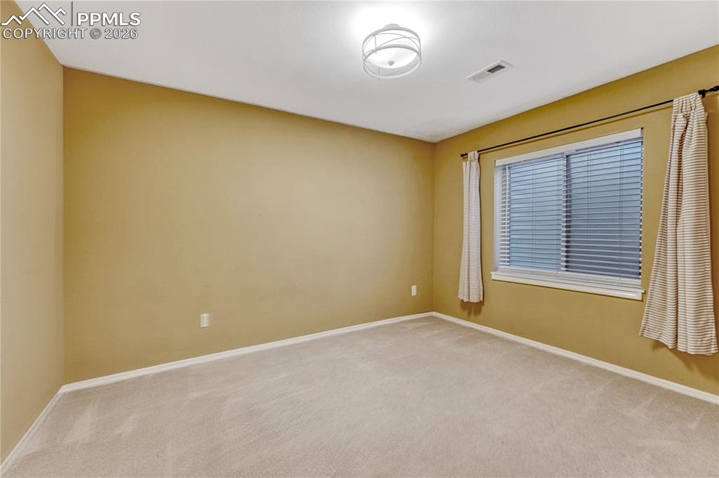 Image 29 of 38: Bedroom