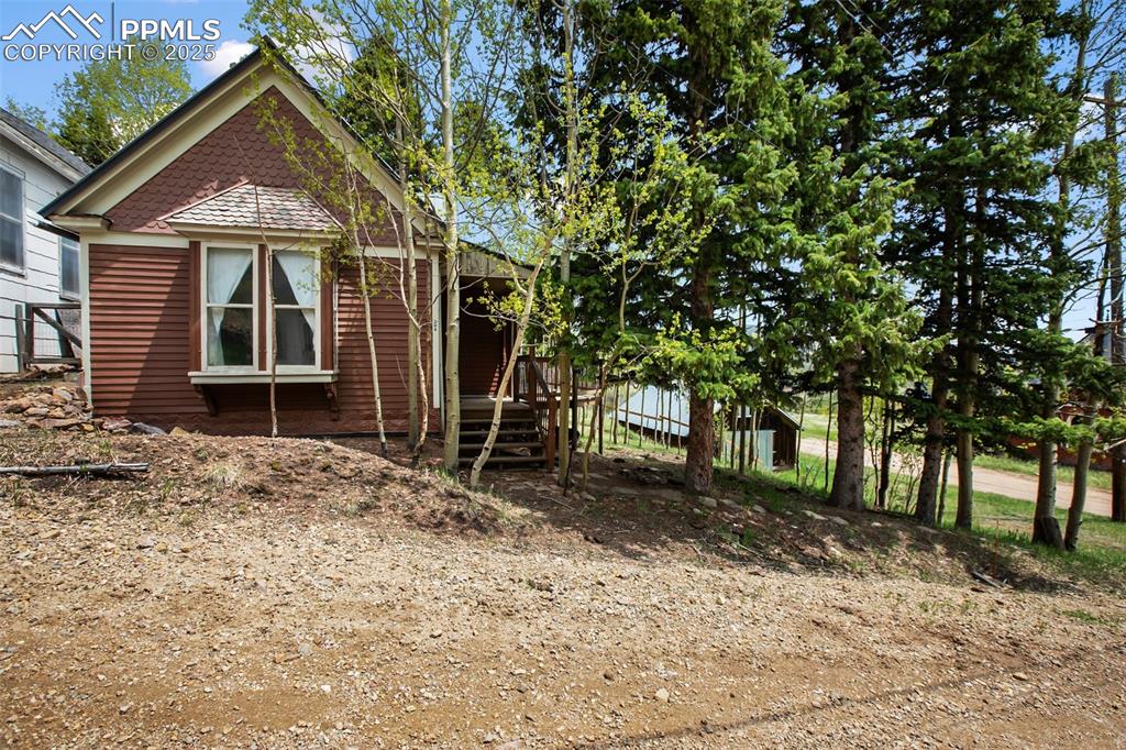 Image 7 of 37: another view from the west, looking right at the bay window