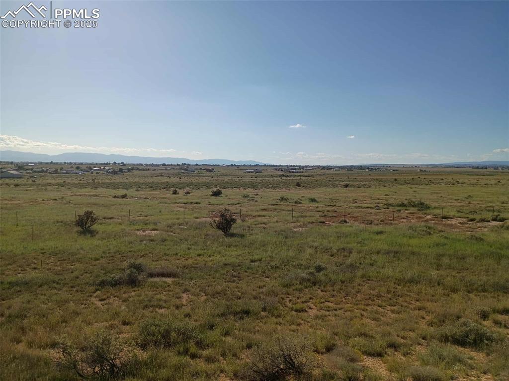 Image 4 of 10: View of undeveloped land with rural landscape