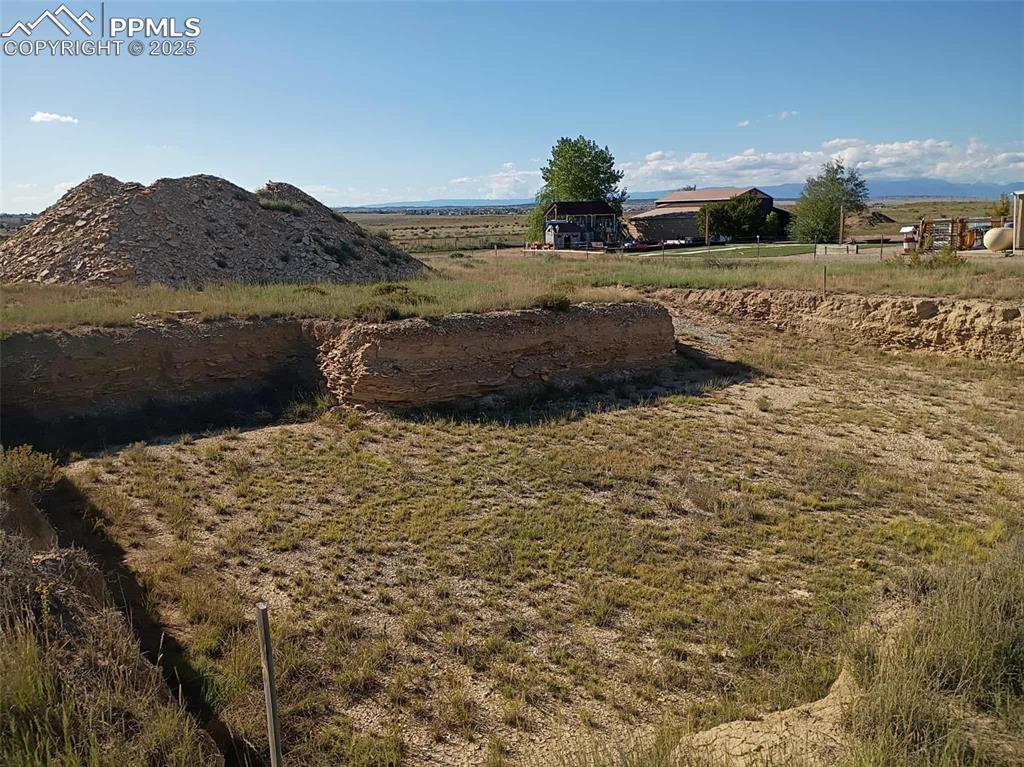 Image 8 of 10: View of yard featuring a rural view