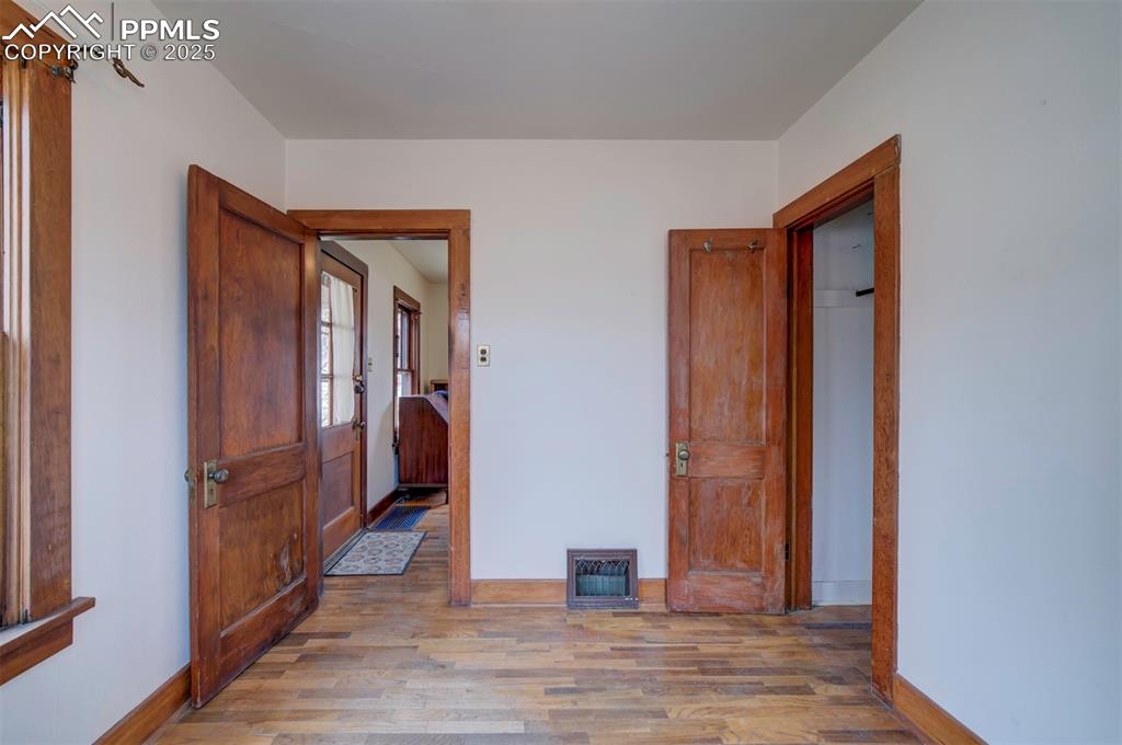 Image 27 of 40: Front bedroom view to living room