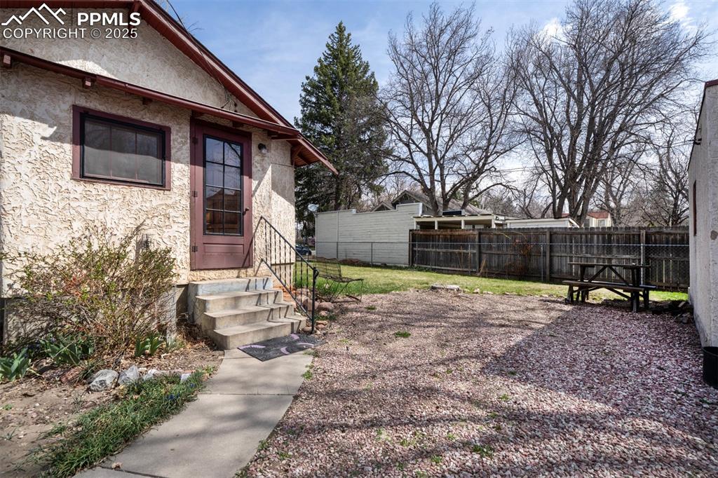Image 38 of 40: Extra parking room between garage and back door