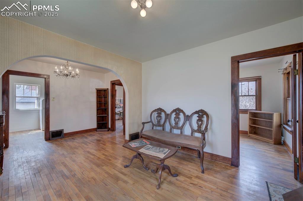 Image 8 of 40: View from living room.  Bedroom 1 on right side.  Dining room and then bedr