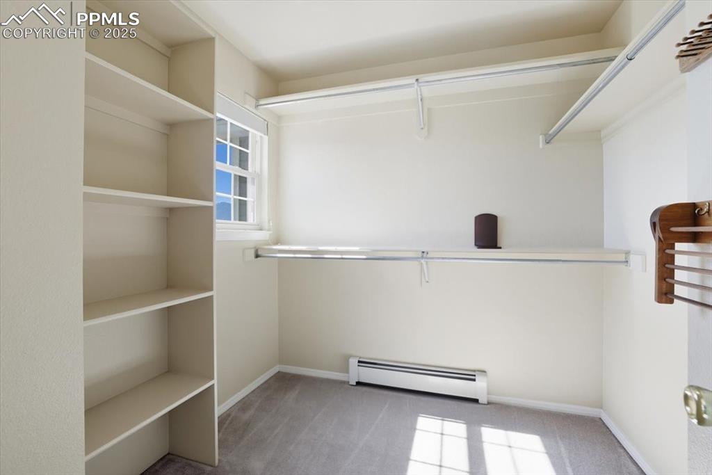 Image 28 of 48: primary walk in closet