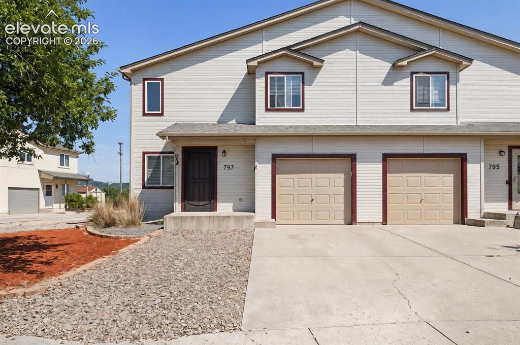 Image 2 of 13: (Left) side of duplex