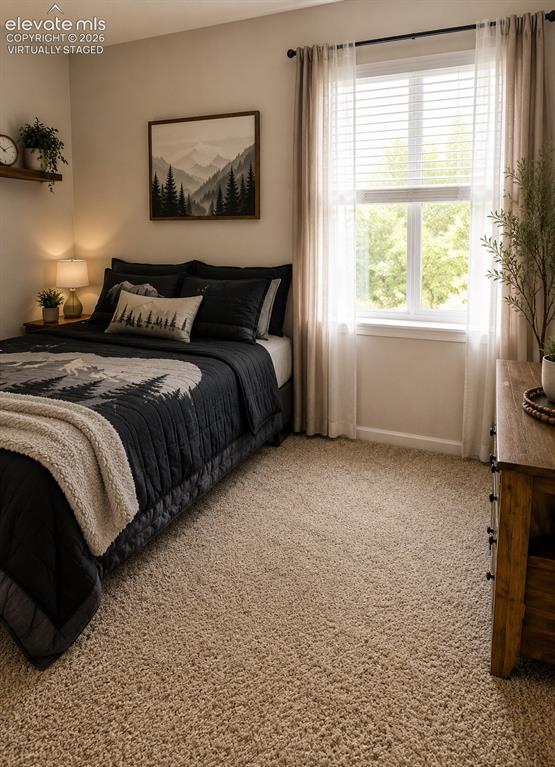 Image 7 of 13: VIRTUALLY STAGED - One of the Bedrooms