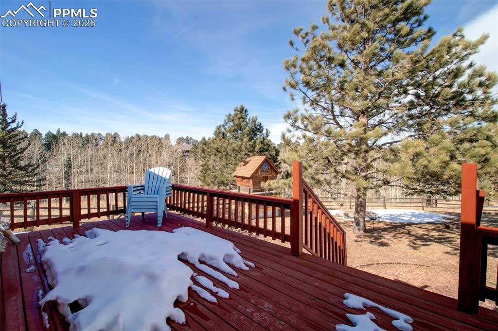 Image 13 of 38: Dining room with walk out to the spacious back deck