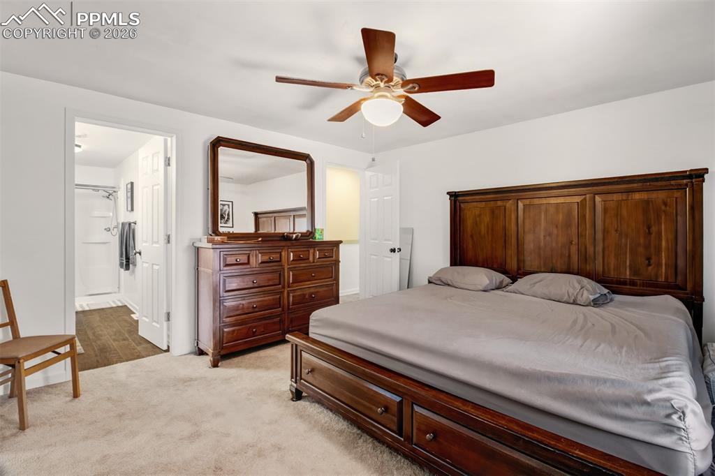 Image 16 of 38: Primary bedroom with walk in closet, en suite bathroom and attached sitting