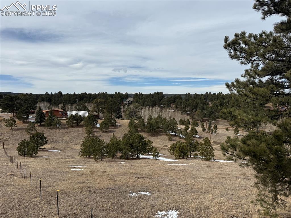 Image 37 of 38: Fenced Land