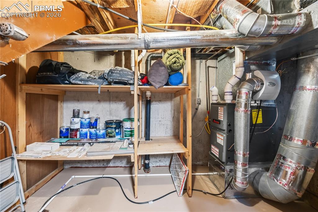 Image 26 of 40: mechanical room also provides additional storage