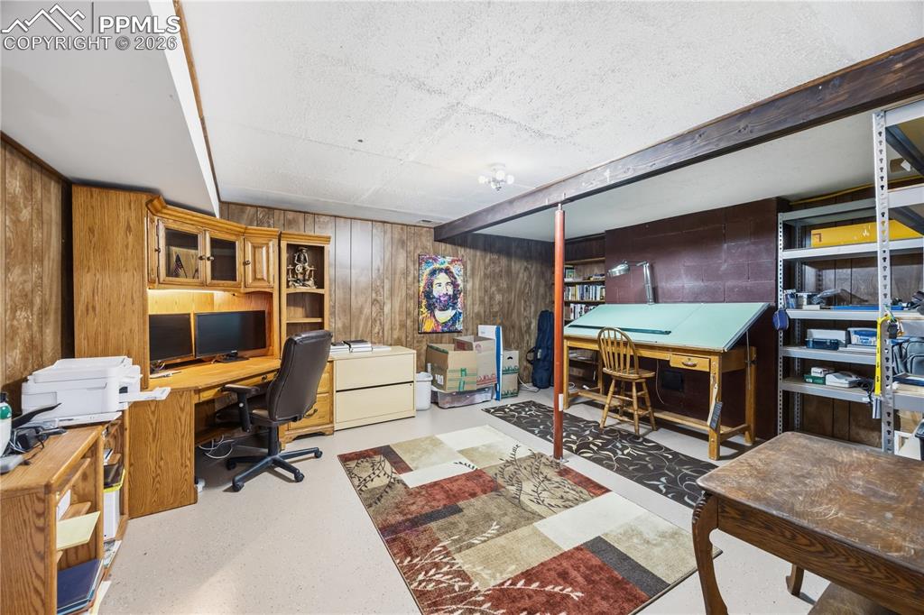 Image 28 of 40: basement with fresh epoxy flooring