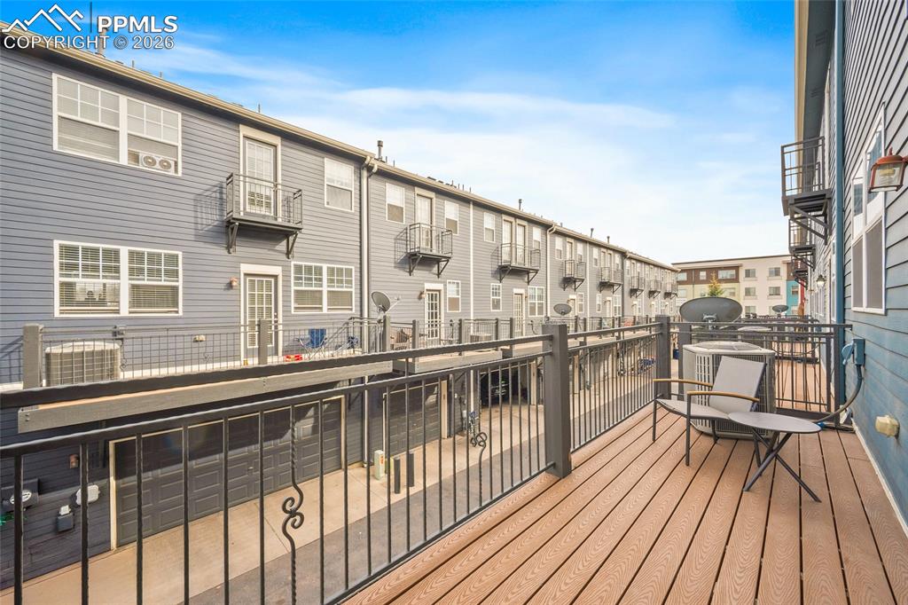 Image 26 of 49: Walk out from the kitchen! Great for BBQ