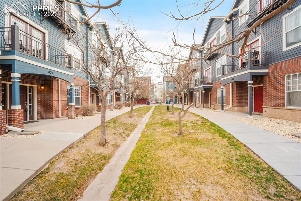 Image 4 of 49: Gated entry to a community feel to this great complex.  