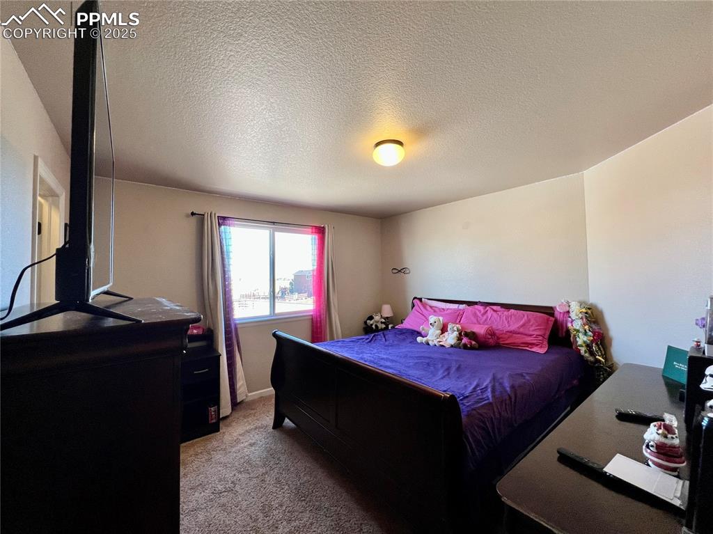 Image 30 of 37: Bedroom