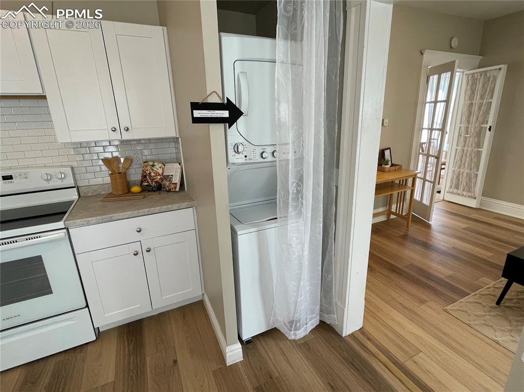 Image 22 of 30: House New Stackable Washer/Dryer