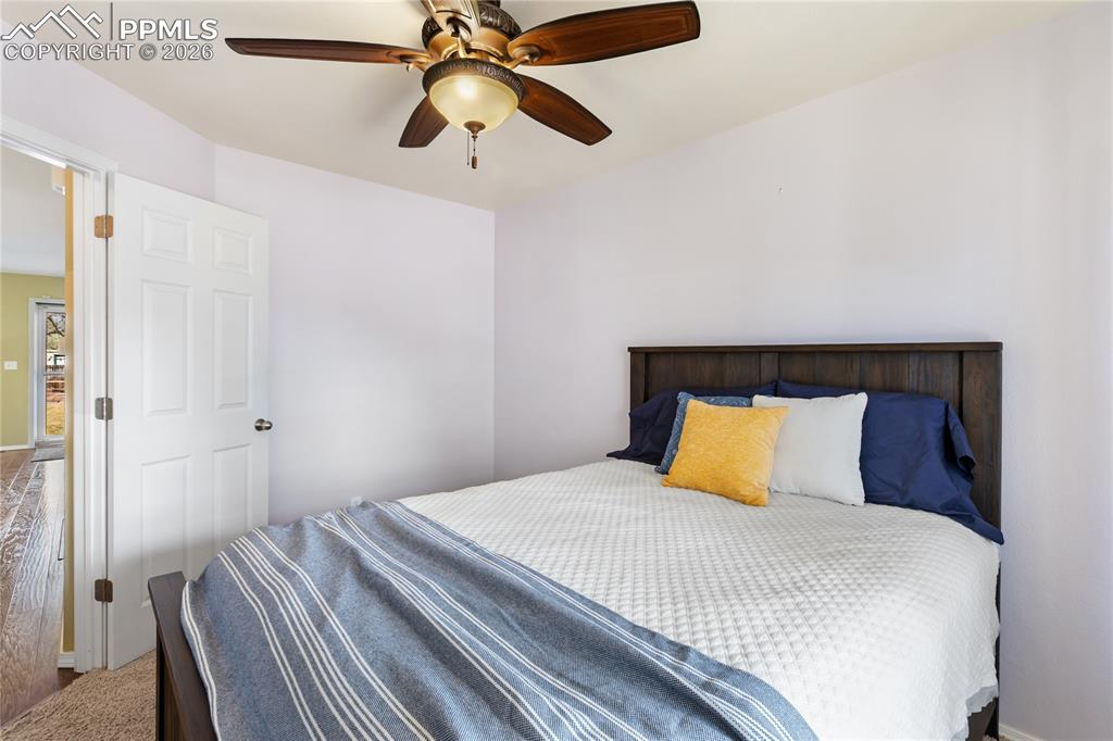 Image 26 of 36: Bedroom featuring ceiling fan and baseboards