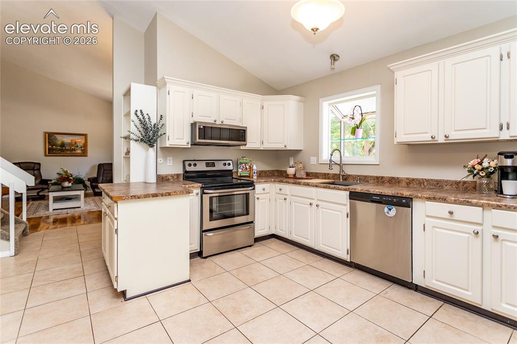Image 11 of 40: Kitchen faces west.