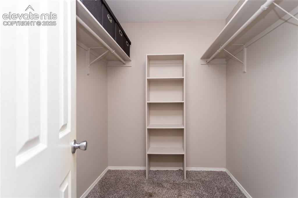 Image 16 of 40: Large walk-in closet.