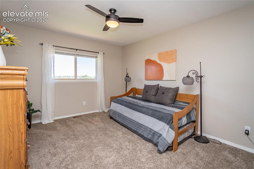 Image 19 of 40: Large upper level second bedroom.