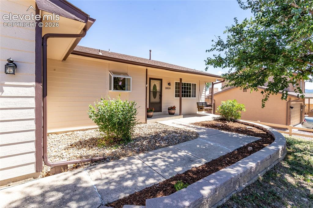 Image 2 of 40: Enjoy your covered front porch and swing with Mountain Views.