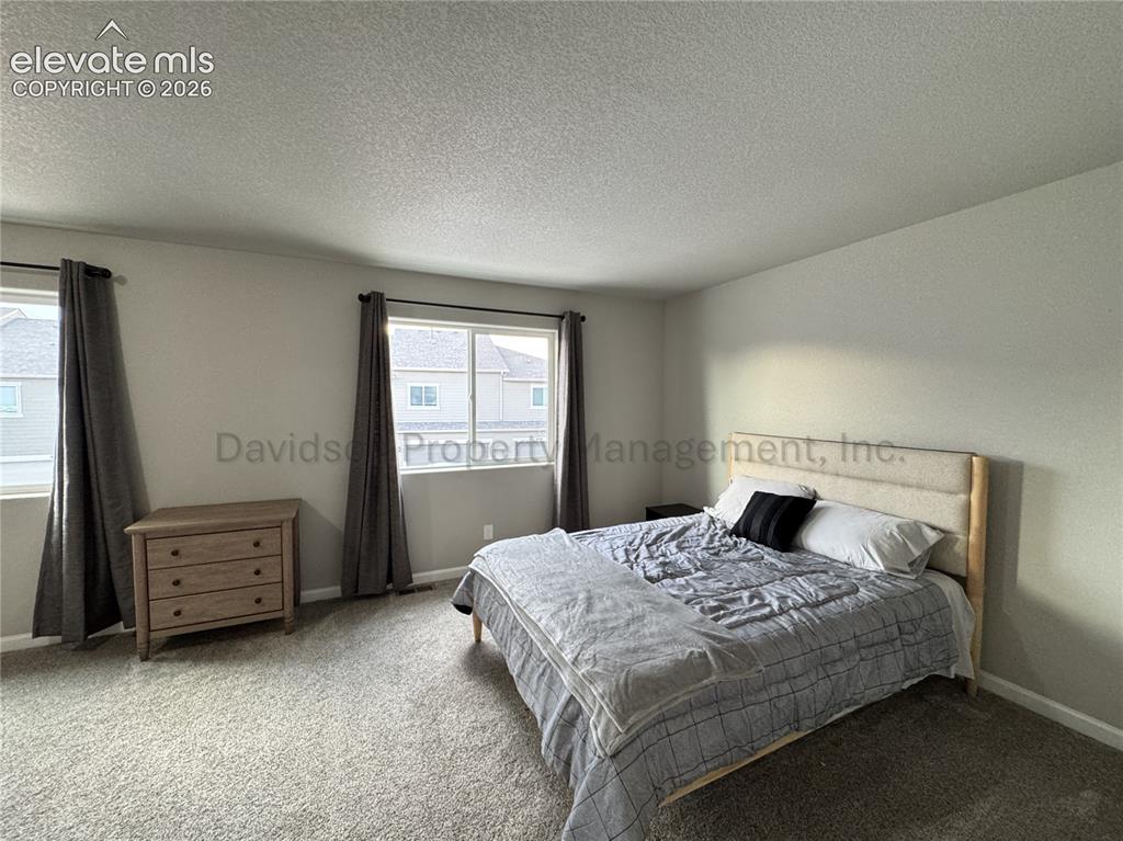 Image 8 of 16: Bedroom
