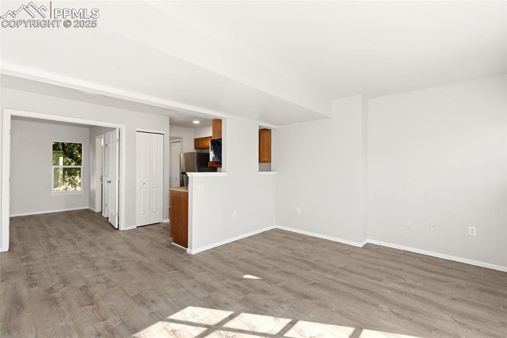 Image 12 of 34: Main Level Living Room and Dining Area!