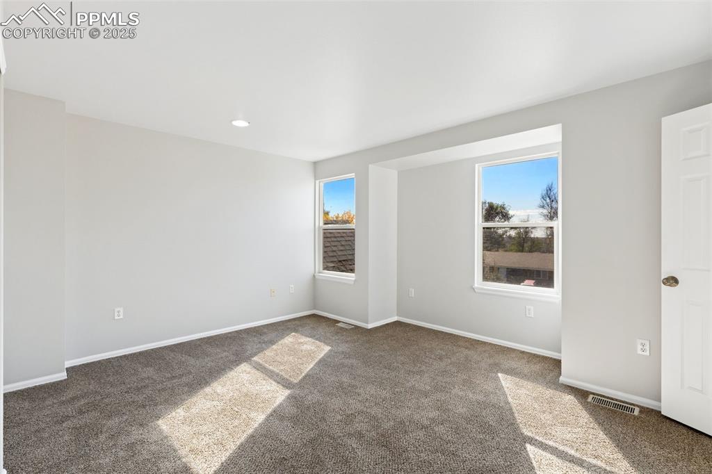 Image 18 of 34: Spacious Upper Level Primary Bedroom!