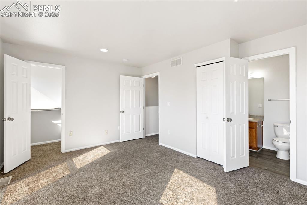 Image 19 of 34: Walk-in Closet and En Suite Bathroom!