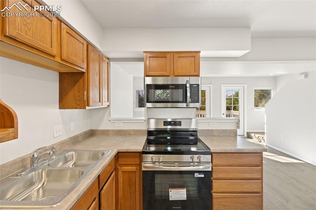 Image 9 of 34: Ample Cabinets and Counter Space!