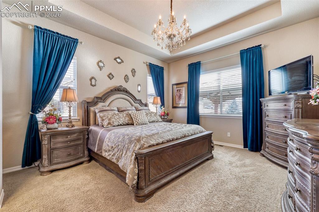 Image 23 of 50: Master Bedroom