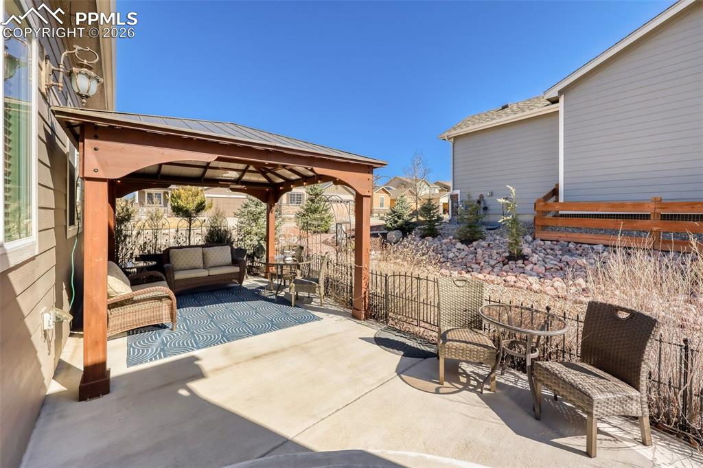 Image 34 of 50: Backyard Patio/Pergola