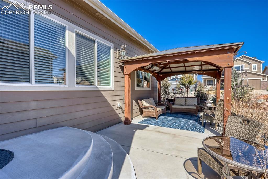 Image 35 of 50: Backyard Patio/Pergola