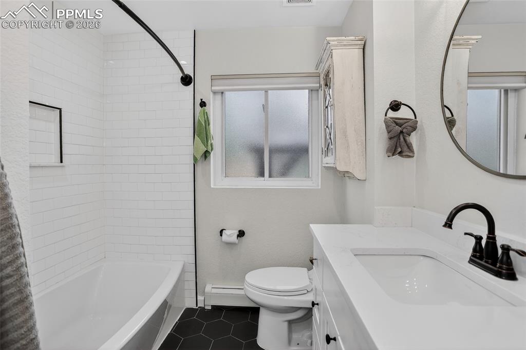 Image 19 of 49: Main level primary bath