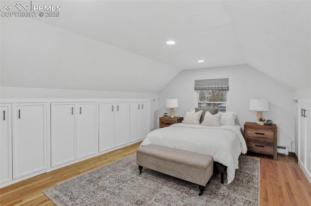 Image 20 of 49: Upper level primary bedroom