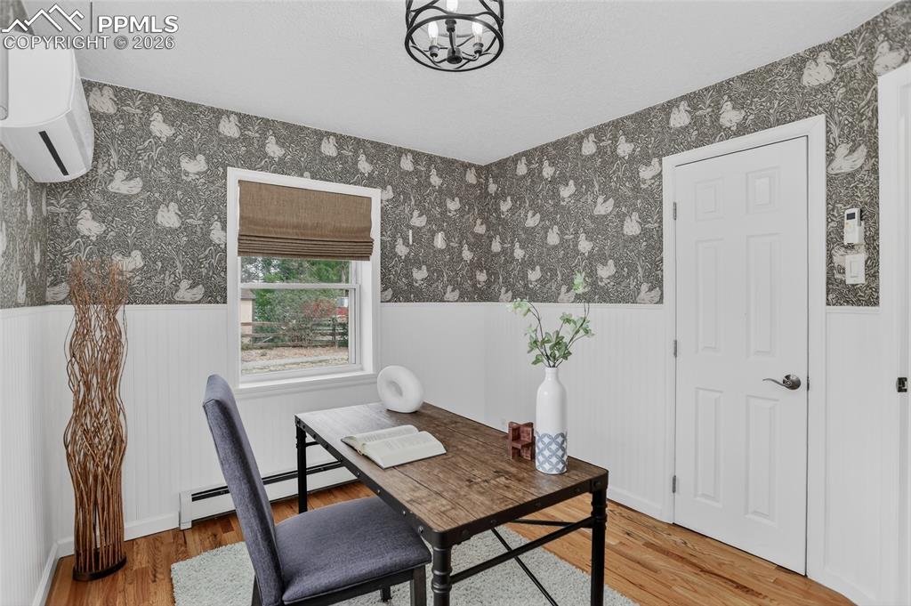 Image 28 of 49: Main level bedroom / office