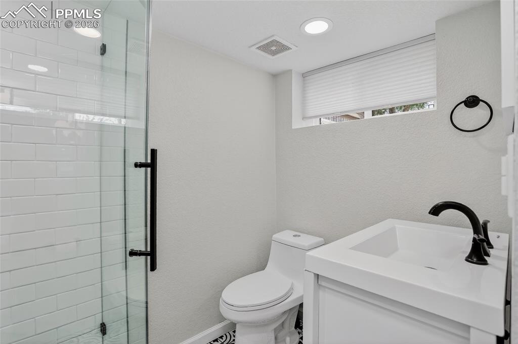 Image 32 of 49: Bath in basement 