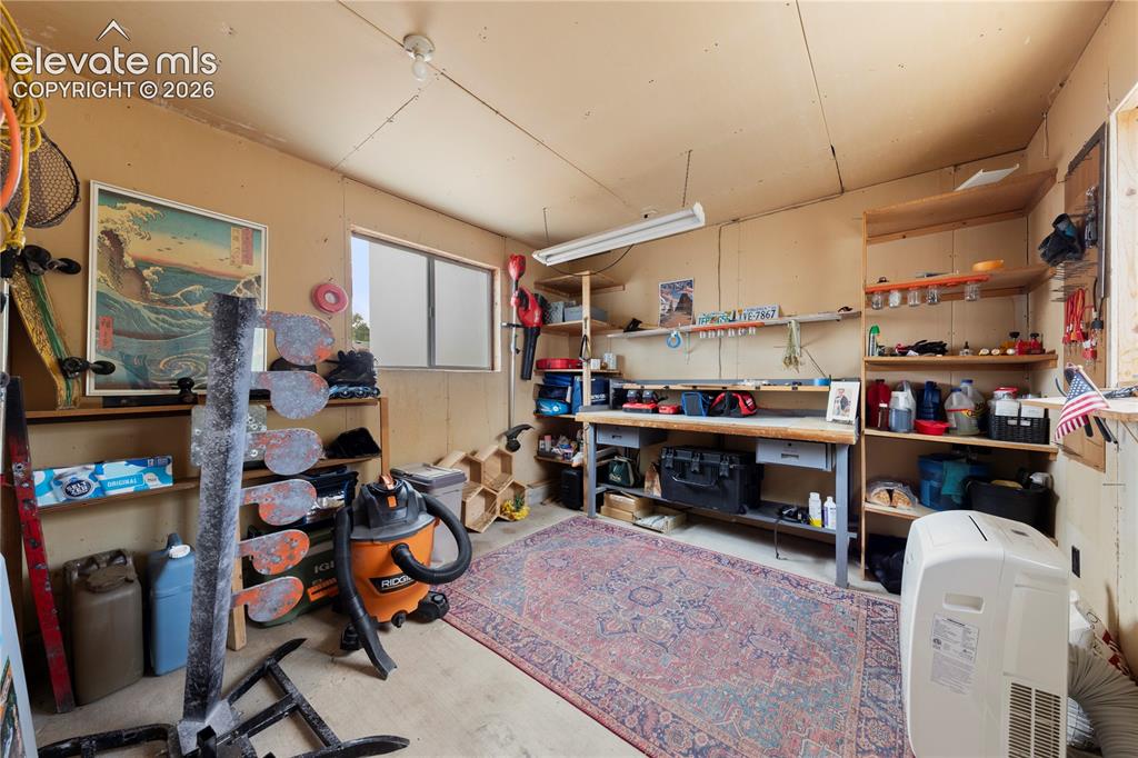 Image 36 of 49: Garage Workshop